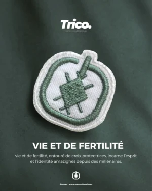 Vie et de Fertilité vie et de fertilité, entouré de croix protectrices, incarne l’esprit et l’identité amazighes depuis des millénaires.