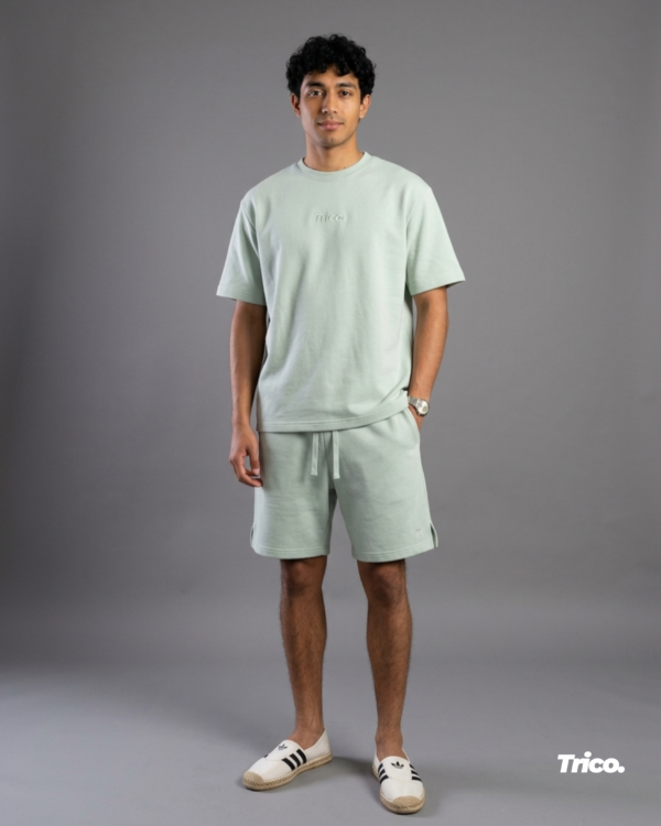 The Relaxed Fit Subtle Green detail — Trico Maroc